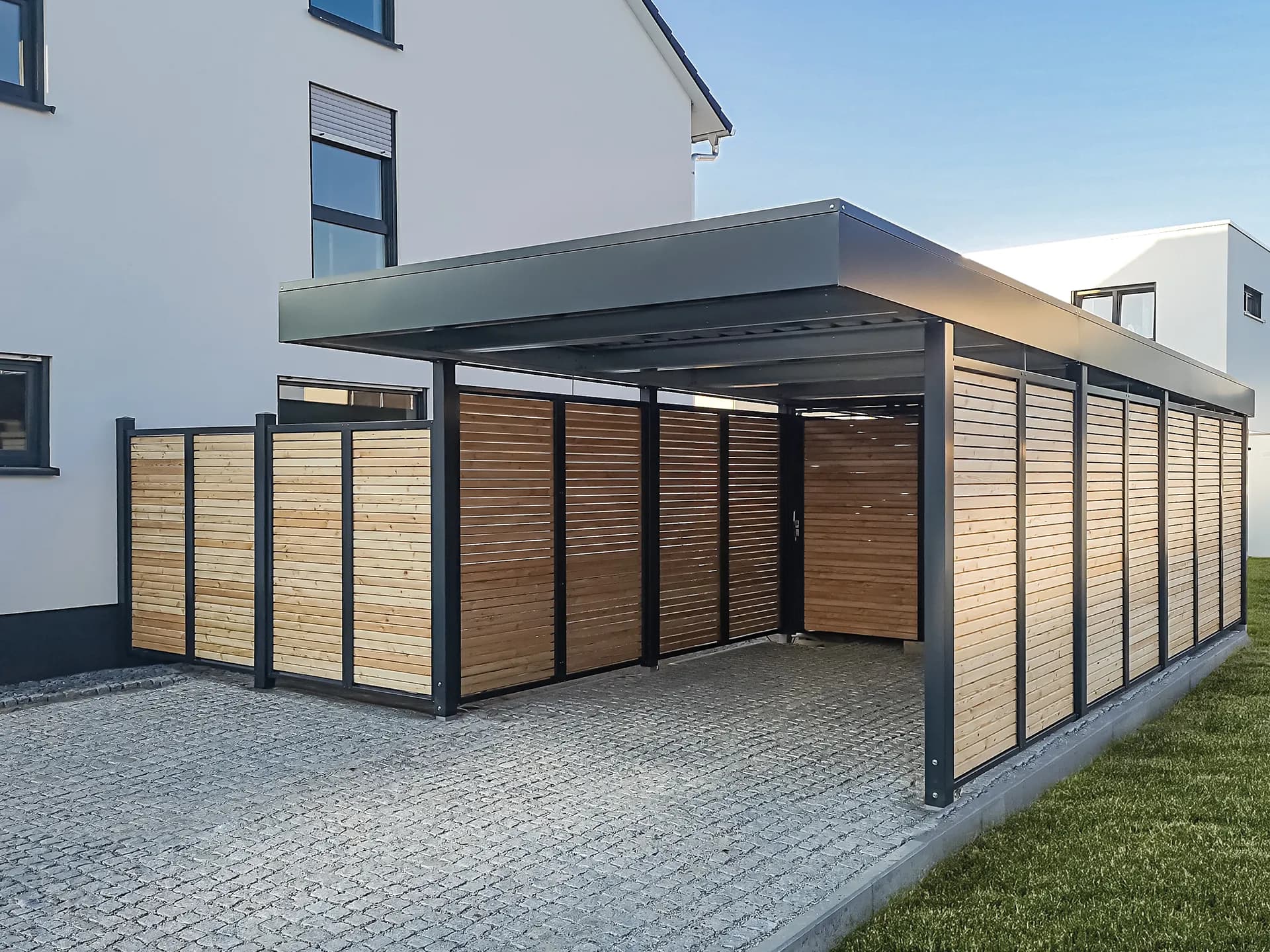 Wohnraum im Grünen: Anbau mit Wintergarten als natürliche Erweiterung